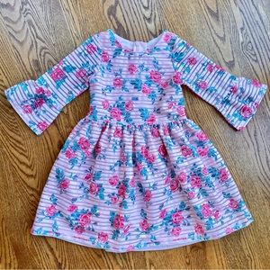 Girls floral dress with trumpet sleeves, fully lined.